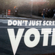Sign reading, "Don't just scream, VOTE"
